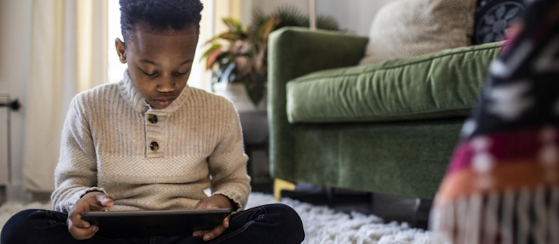 Child using his tablet